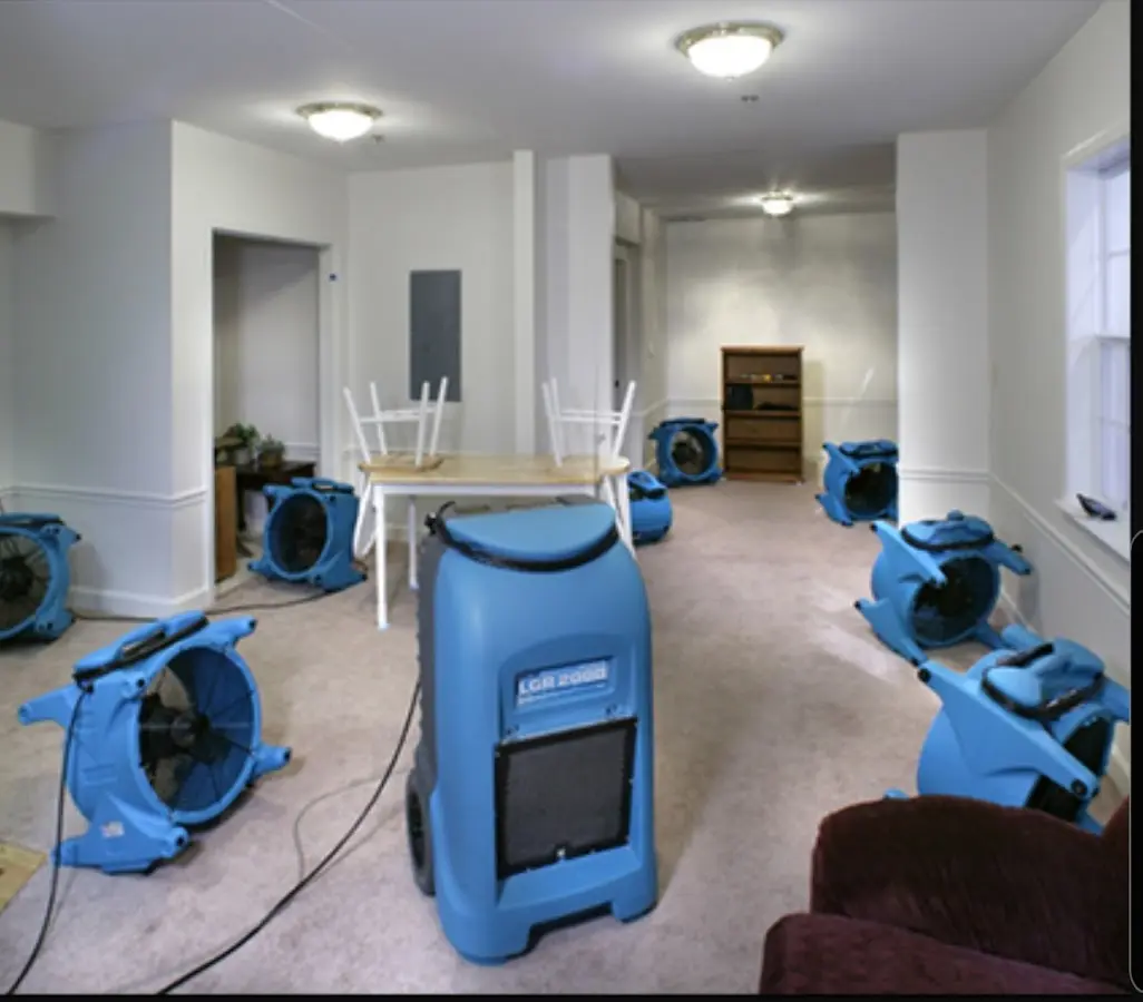 Air movers and dehumidifier setup for Water Damage Restoration in La Joya